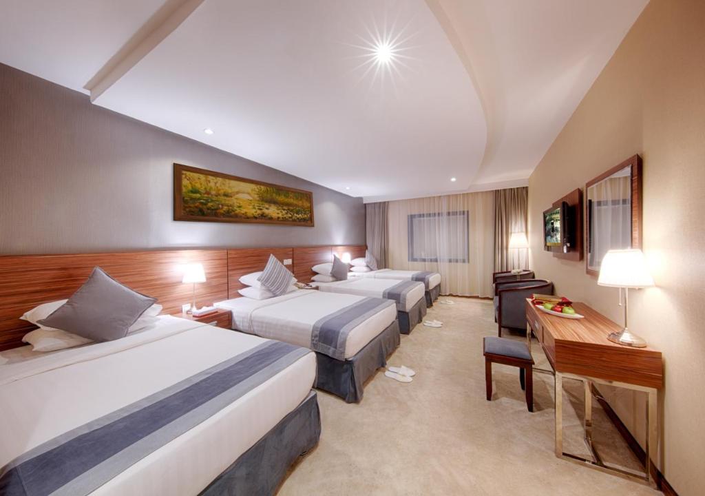 Standard Quadruple Room - Bed